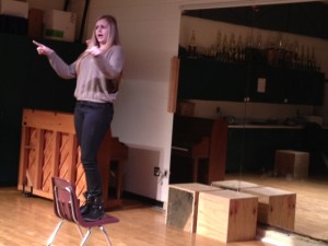 Blake High freshman Samantha Ely sings for visitors from Magnet Schools of America.