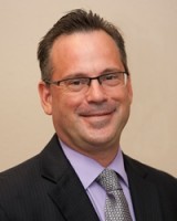 Dr. Jesse Coraggio