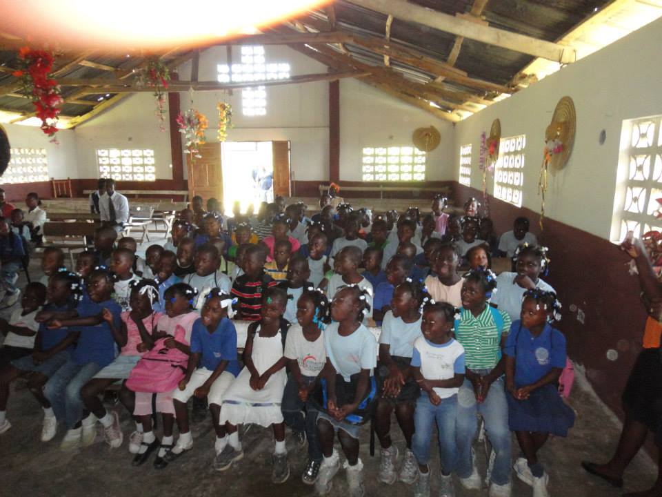 Students of the Genecoit School of Excellence in Haiti may have a new school building by the end of this year. Charter Schools USA, through its charitable arm, is raising money to help build the private, tuition-free school. PHOTO: Charter Schools USA