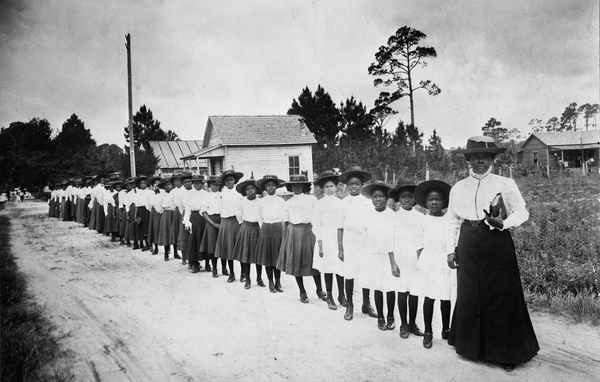 Mary McLeod Bethune leads a line of girls from the school she founded. ca, 1905. State Archives of Florida, Florida Memory