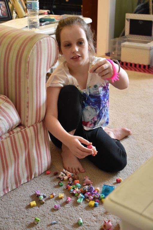 Emily with toys
